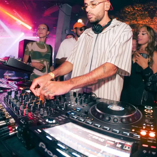 Team member DJing at a company event